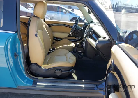 2010 Mini Cooper z USA, uszkodzony, nr VIN WMWMF3C53ATZ24647